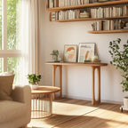 Sculpted Console Table with cut-out legs styled in a cozy modern living room