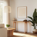 Sculpted Console Table with cut-out legs styled in a cozy modern living room