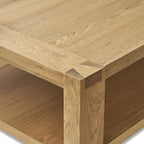 Square modern coffee table with open shelf for storage