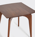 Timeless Mid-Century Modern Side Table with tapered legs.