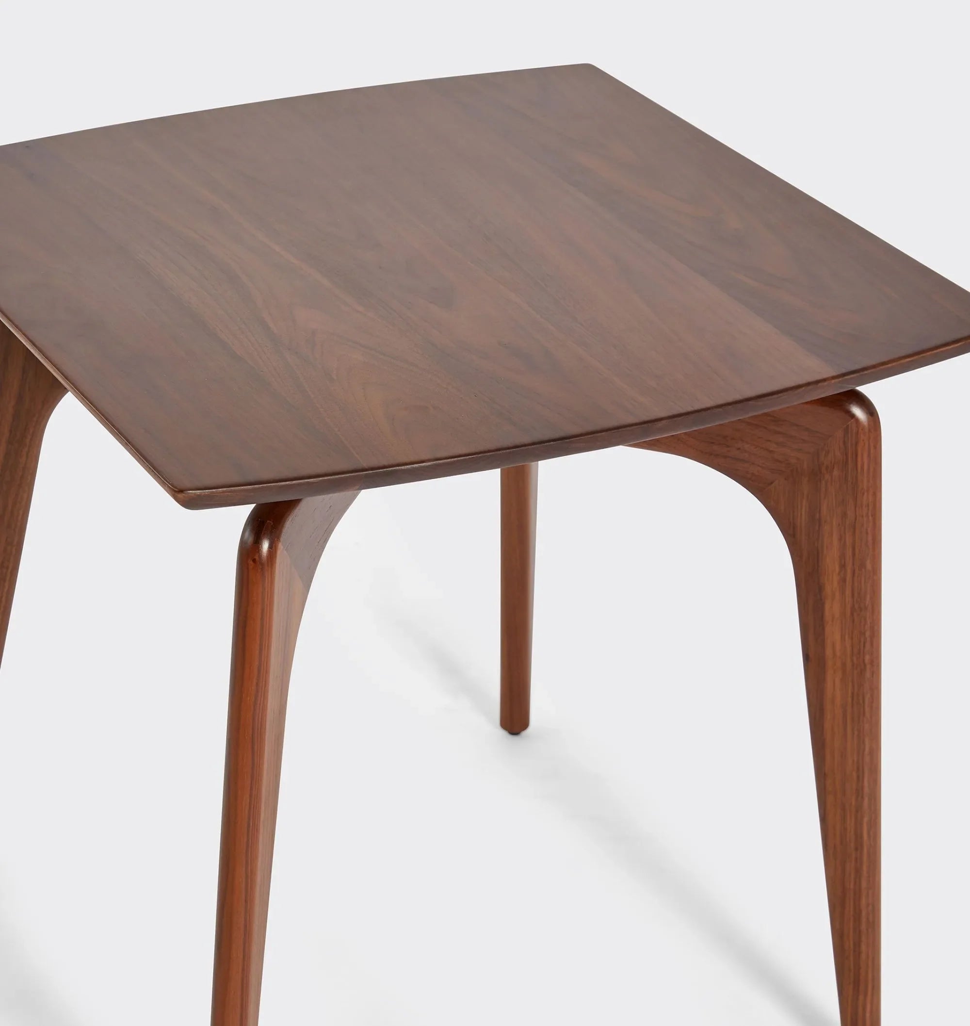 Timeless Mid-Century Modern Side Table with tapered legs.
