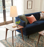 Timeless Mid-Century Modern Side Table with tapered legs.