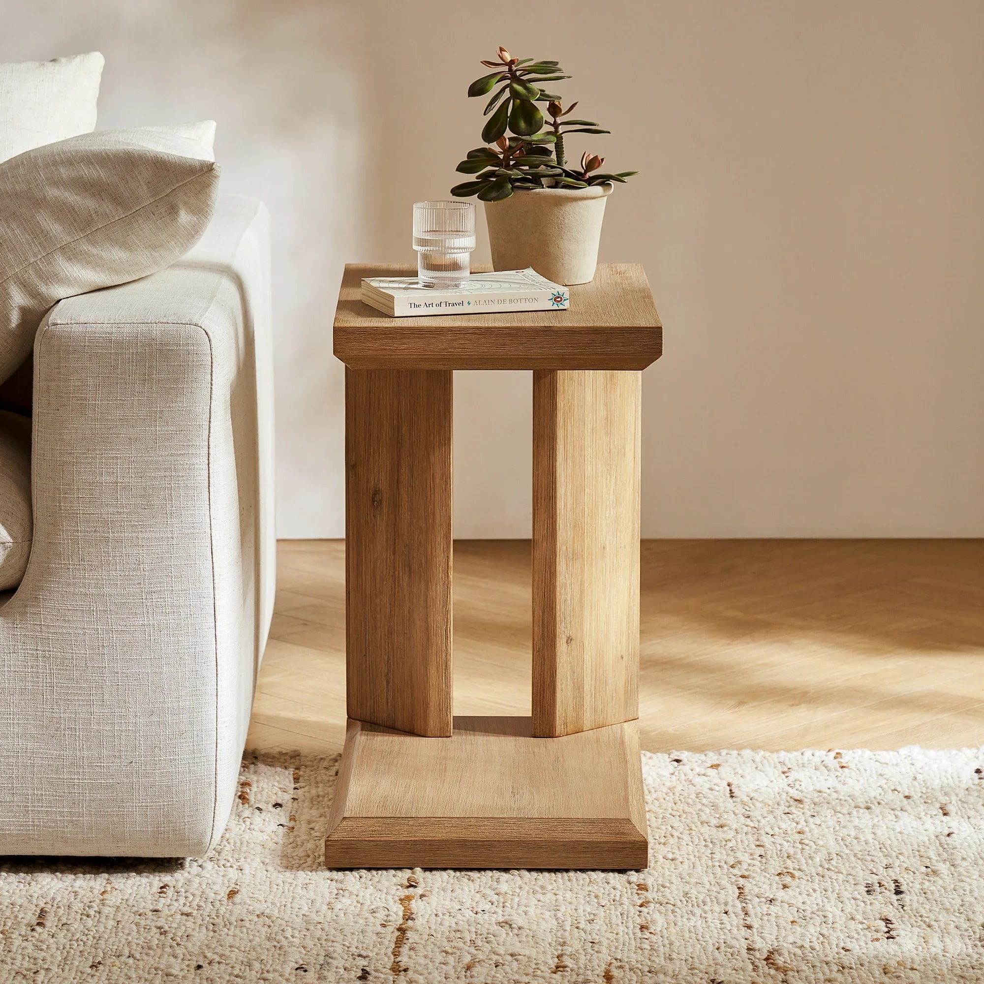 Versatile side table with a sleek modern design, perfect for compact spaces and everyday convenience.